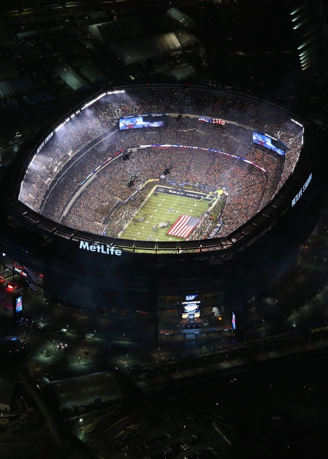 EAST RUTHERFORD, NJ - FEBRUARY 02: U.S. Army helicopters from the 101st Combat Aviation Brigade fly over Metlife Stadium ahead of Super Bowl XLVIII between the Seattle Seahawks and the Denver Broncos on February 2, 2014 in East Rutherford, New Jersey. More than 80,000 fans were expected to fill the stadium for the first Super Bowl to be played in an outdoor stadium in a cold weather city. (Photo by John Moore/Getty Images)