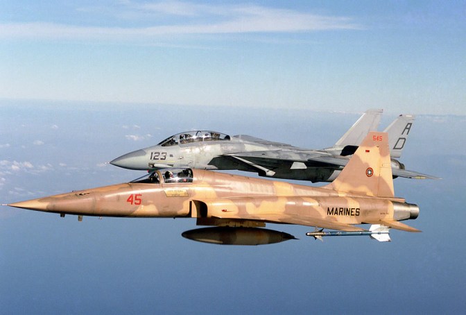 "Whoa, MiG-28s, no one's been this close before!" Just kidding, that's an F-5 with an F-14. US Navy photograph.