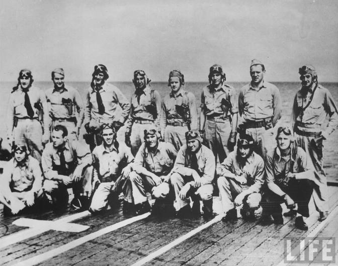 Pilots of Hornet's VT-8 shortly before battle of Midway. Standing (L-R): Owens, Ensign Fayle, Waldron, R.A. Moore, J.M. Moore, Evans, Teats, Cambell. Kneeling (L-R): Ellison, Kenyon, Gray, sole survivor Gay, Woodson, Creamer, Miles