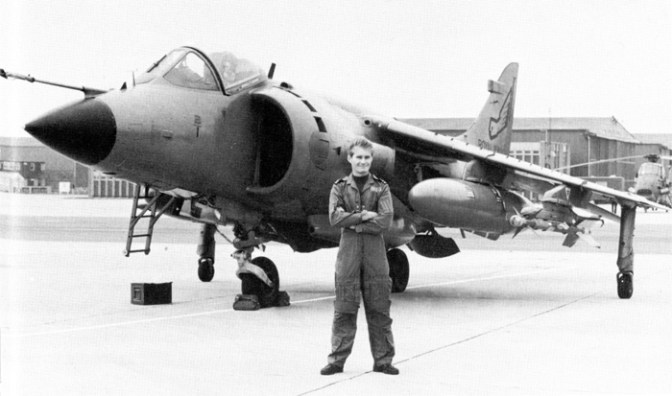 Sub-Lt. Ian "Soapy" Watson with his Sea Harrier on dry land. (MoD Photograph)