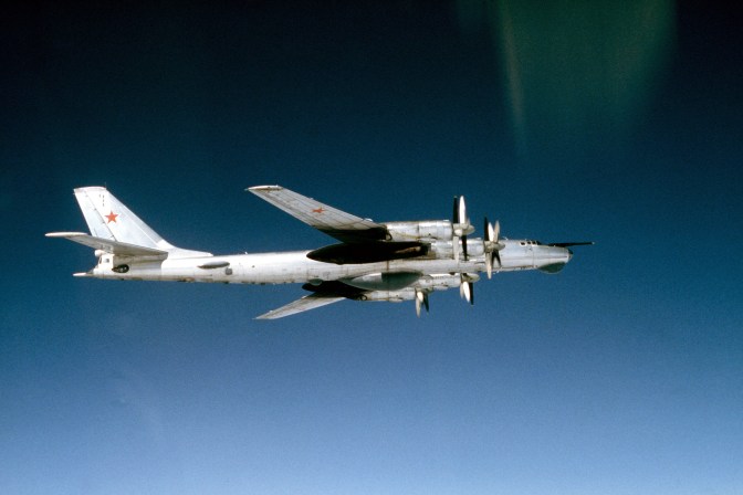 An air-to-air right side view of a Soviet Tu-95RTs Bear D strategic bomber aircraft. Date Shot: 5 May 1983 (U.S. Navy photograph/released)