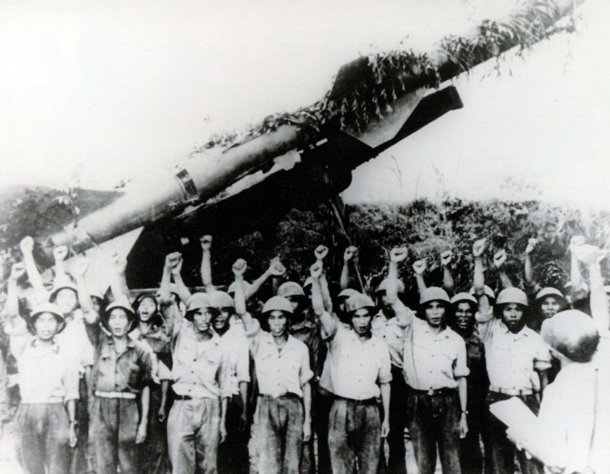North Vietnamese SAM crew in front of SA-2 launcher. 