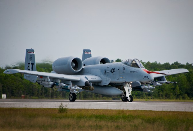 An A-10C Thunderbolt II from the 40th Flight Test Squadron, moves down the runway at Eglin Air Force Base, Fla. The aircraft is loaded up with weaponry to test the combat carriage limits of the Sargent Fletcher external fuel tank. The A-10 flight personnel are testing to ensure the A-10 can carry the tank into a combat environment safely. If proven to be safe to carry, the tank will add up to 60 minutes of flight time to its combat sortie. (U.S. Air Force photo/Samuel King Jr.)