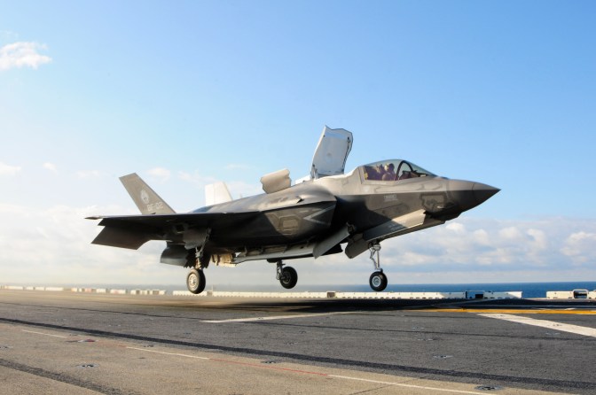 Lt. Col. Fred Schenk lifts an F-35B Lightning II off the flight deck of the amphibious assault ship USS Wasp. The F-35B is the Marine Corps Joint Strike Force variant of the Joint Strike Fighter. The aircraft is undergoing testing aboard Wasp. (U.S. Navy/Released)