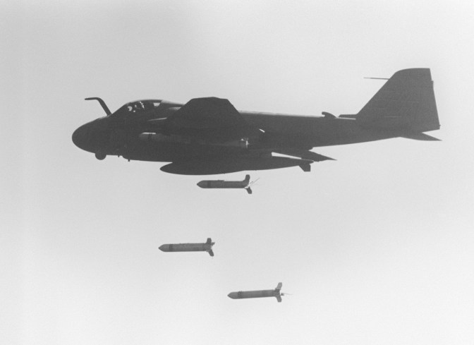 An A-6E Intruder aircraft drops CBU-59 cluster bombs over Iranian targets. (U.S. Navy/released)