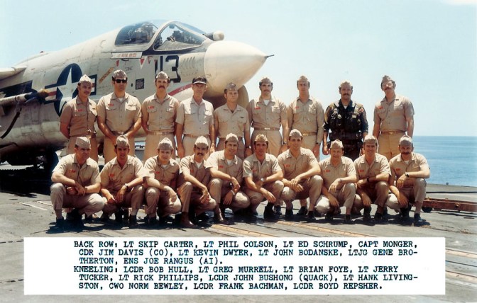 VF-211 pilots from their 1972 cruise. Jerry Tucker is fourth from the left, kneeling down. Frank Bachman is second from the right, also kneeling down. (U.S. Navy archival photograph/released)
