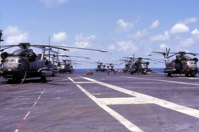 U.S. Air Force Sikorsky HH-53C Super Jolly Green Giant helicopters on the deck of the aircraft carrier USS Midway (CV-41) during en:Operation Frequent Wind, April 1975. (U.S. Navy/released)