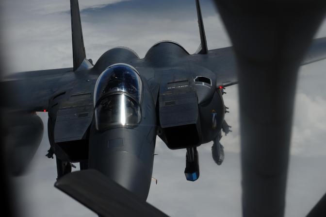 An F-15E Strike Eagle, from the 336th Fighter Squadron also known as the “Rocketeers,” Seymour Johnson AFB, N.C., Seymour Johnson Air Force Base, maneuvers into position to receive fuel from a KC-135 Stratotanker, assigned to the 340th Expeditionary Air Refueling Squadron, over Afghanistan in support of Operation Enduring Freedom, March 29.